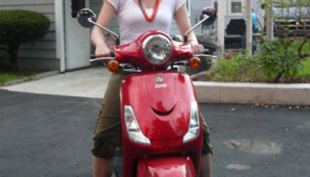 Sarah with her new scooter