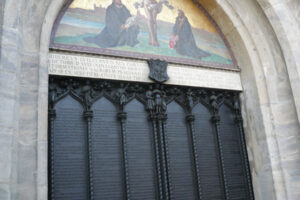 The famous door of the Castle Church in Wittenberg, now covered in bronze and engraved with the text of the 95 theses.