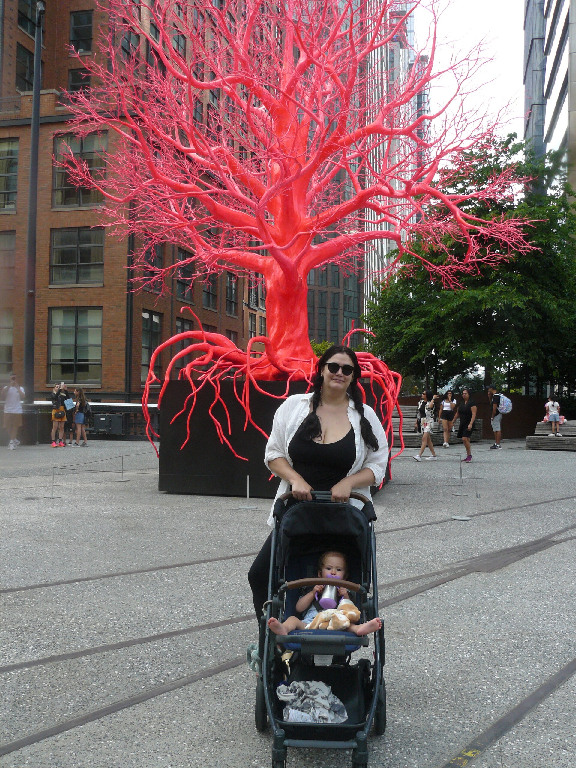 Intrepid mom Sarah Hartshorne in front of 'Old Tree' by Pamela Rosencranz of Zurich on the High Line in New York City